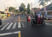 Polsek Pasirian Gelar Poros Pagi, Bantu Siswa Sekolah dan Urai Kemacetan